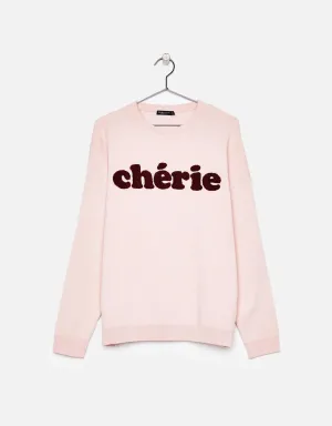 Oversized sweater with slogan